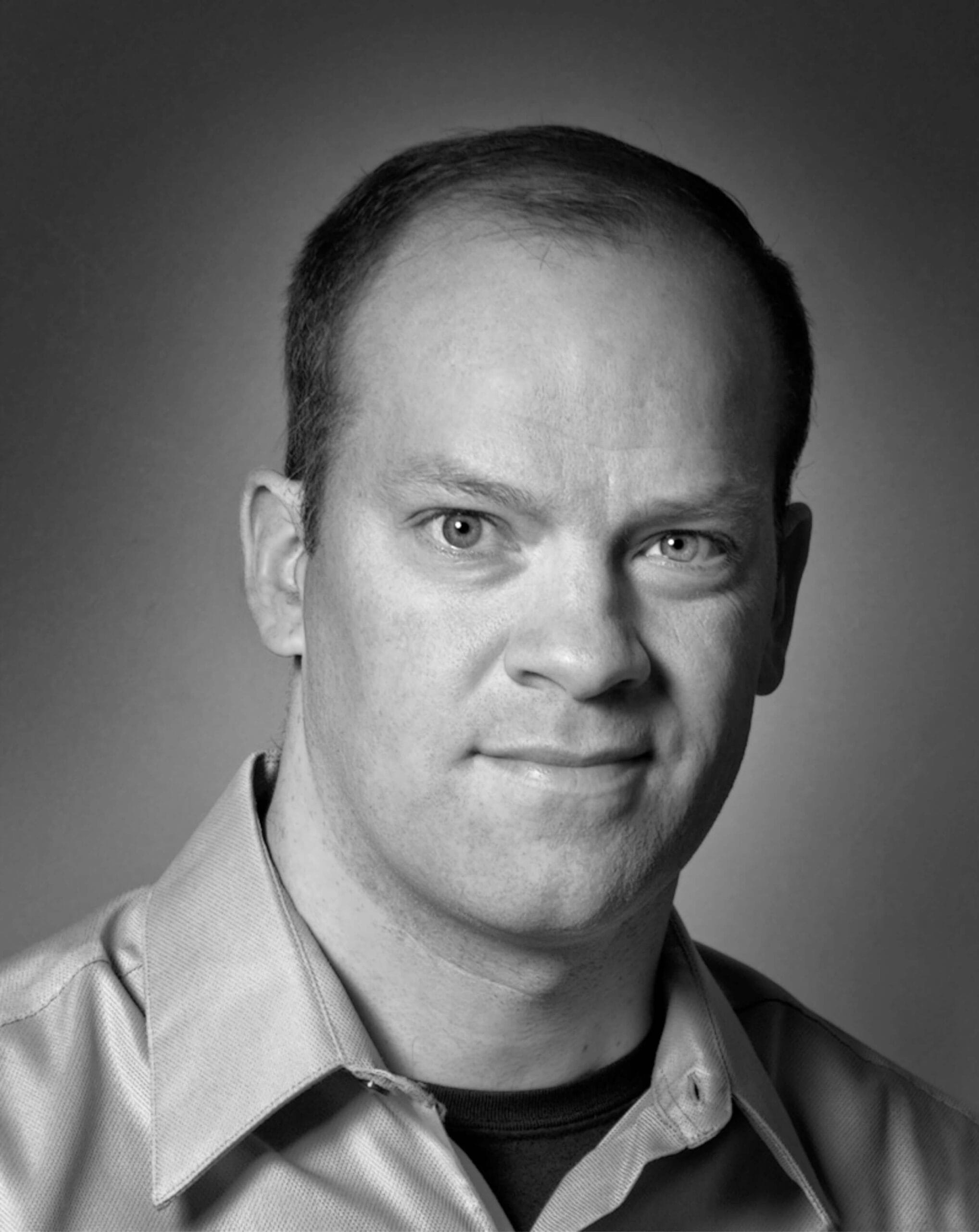 Portrait of John Zinn, CEO of CognaSIM